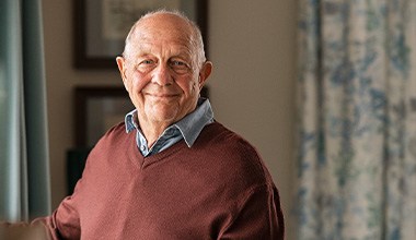Closeup of senior man smiling at home