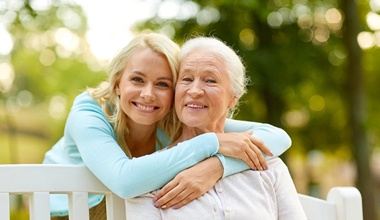 Older woman wearing dentures in Worthington