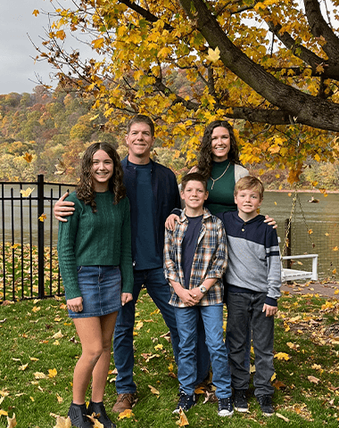 Worthington dentist Dr. LJ Adam with his wife and three kids