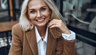 Woman smiling with veneers in Covington