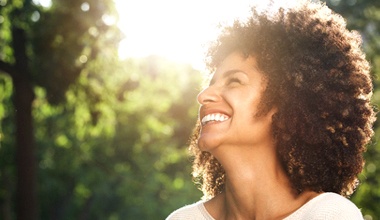 Woman laughing with veneers in Worthington