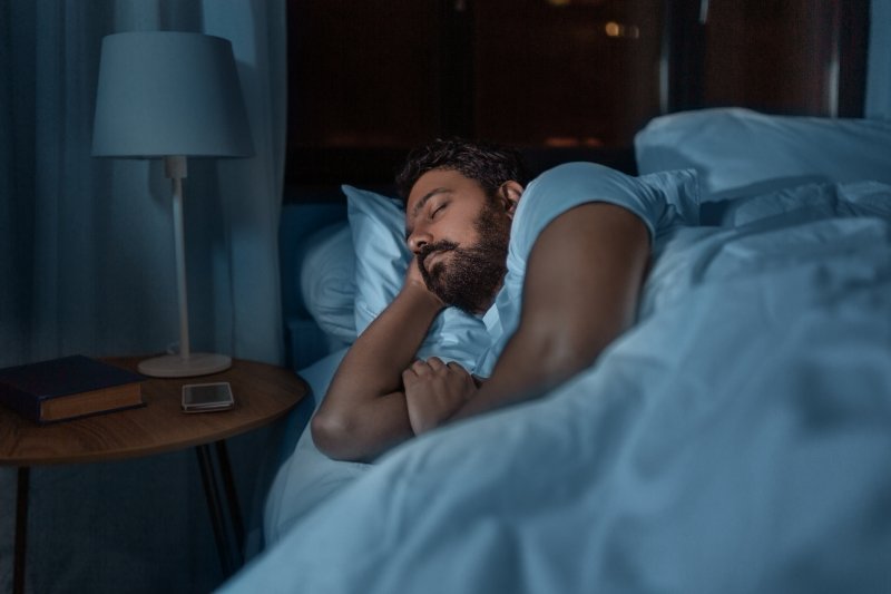 A person sleeping in bed
