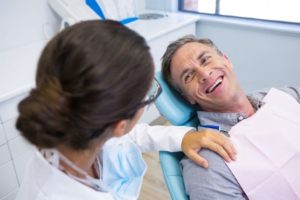 a patient visiting their dentist for a root canal 