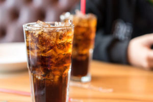 Glasses of soda on table