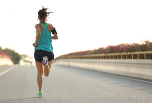 Smiling person going for a run